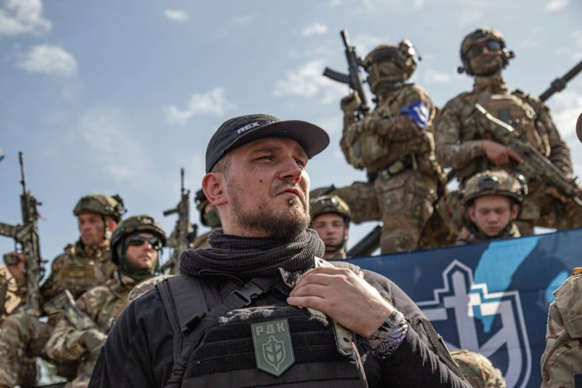 Denis Kapustin pictured with members of the Russian Volunteer Corps paramilitary unit. Photo: Wikipedia